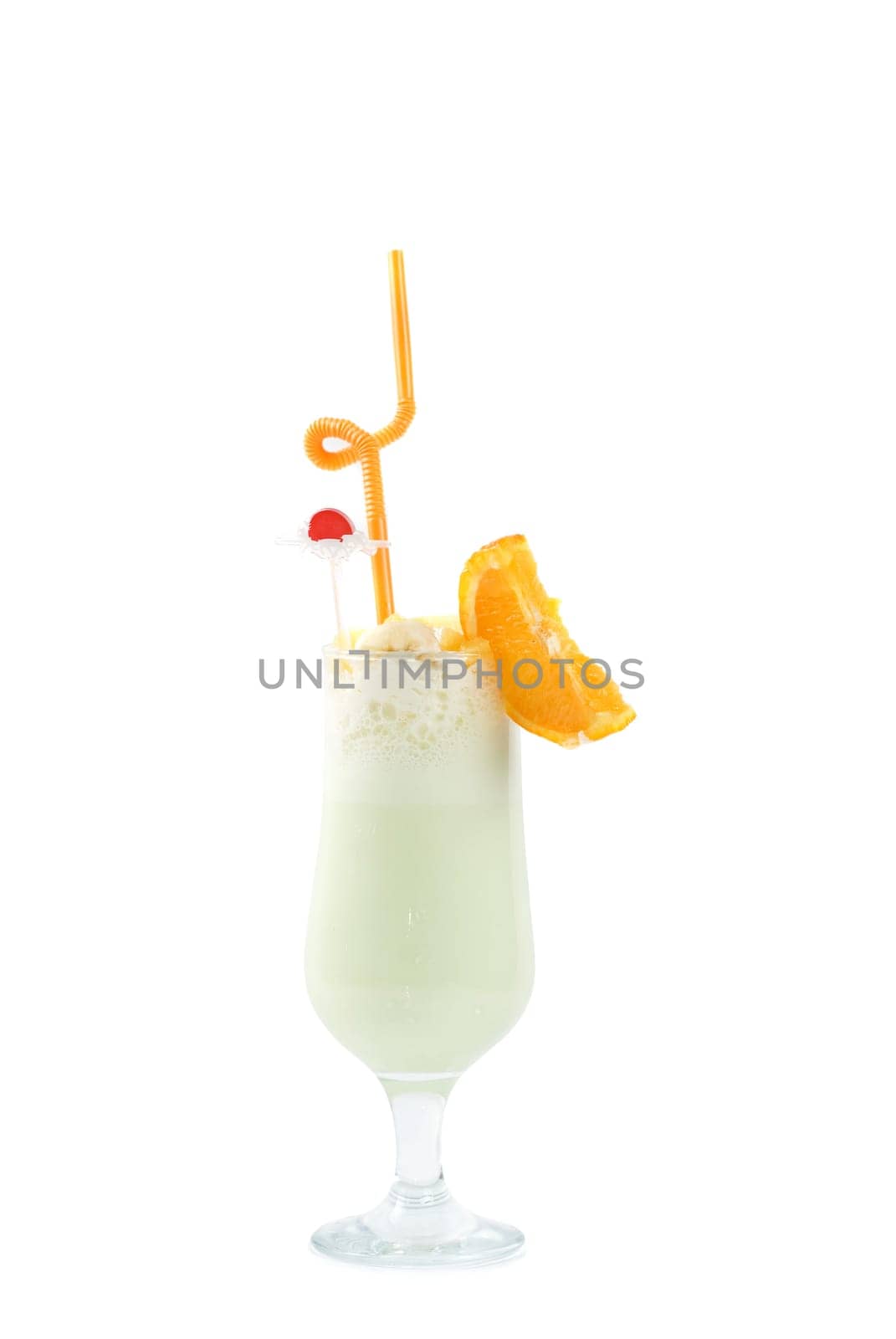 milk fruit cocktail with slice of orange cream and pipe