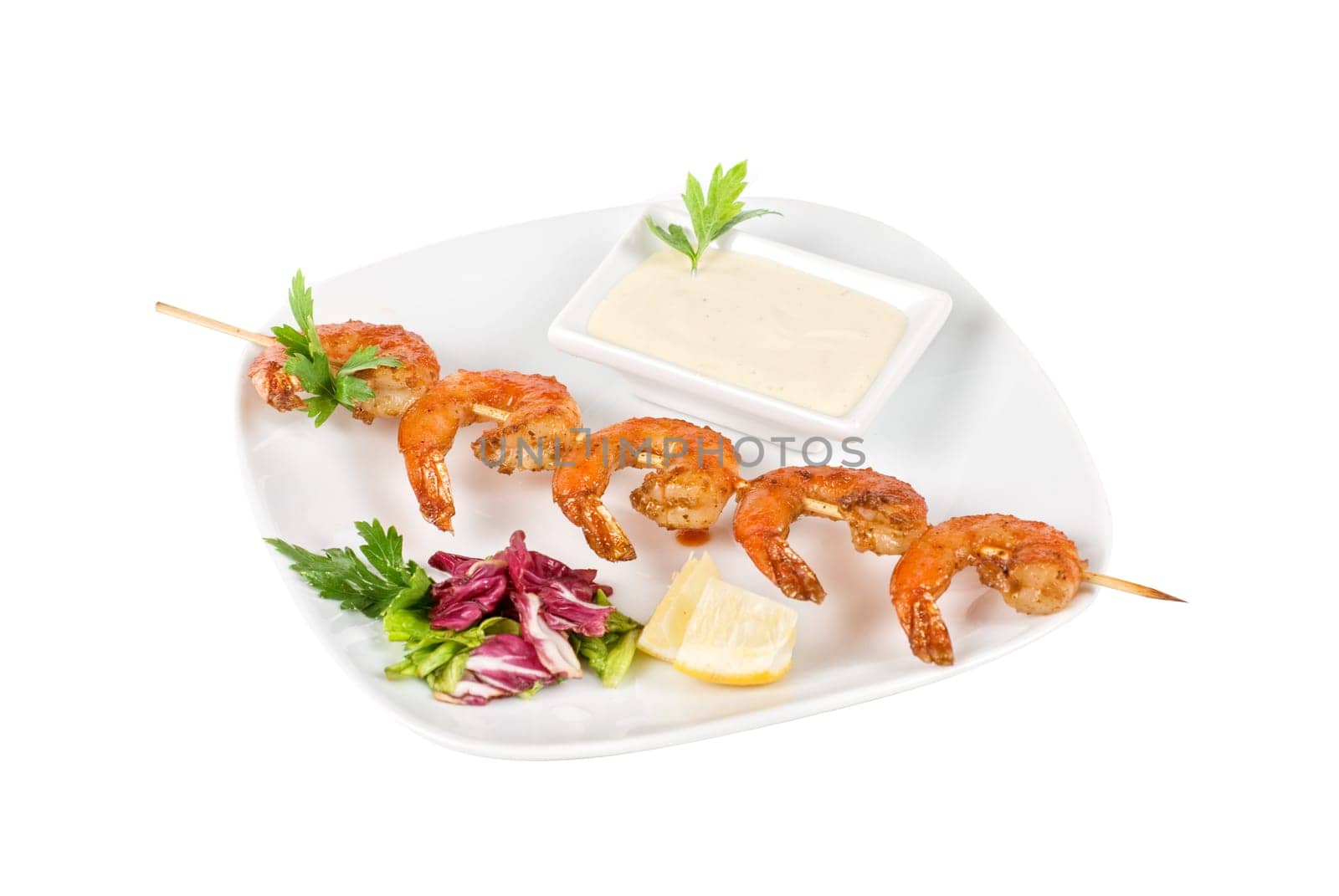 Fried kebab of shrimps with vegetables and sauce