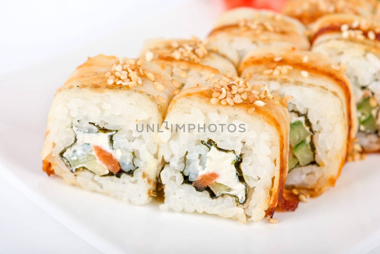 Sushi rolls at plate isolated on a white