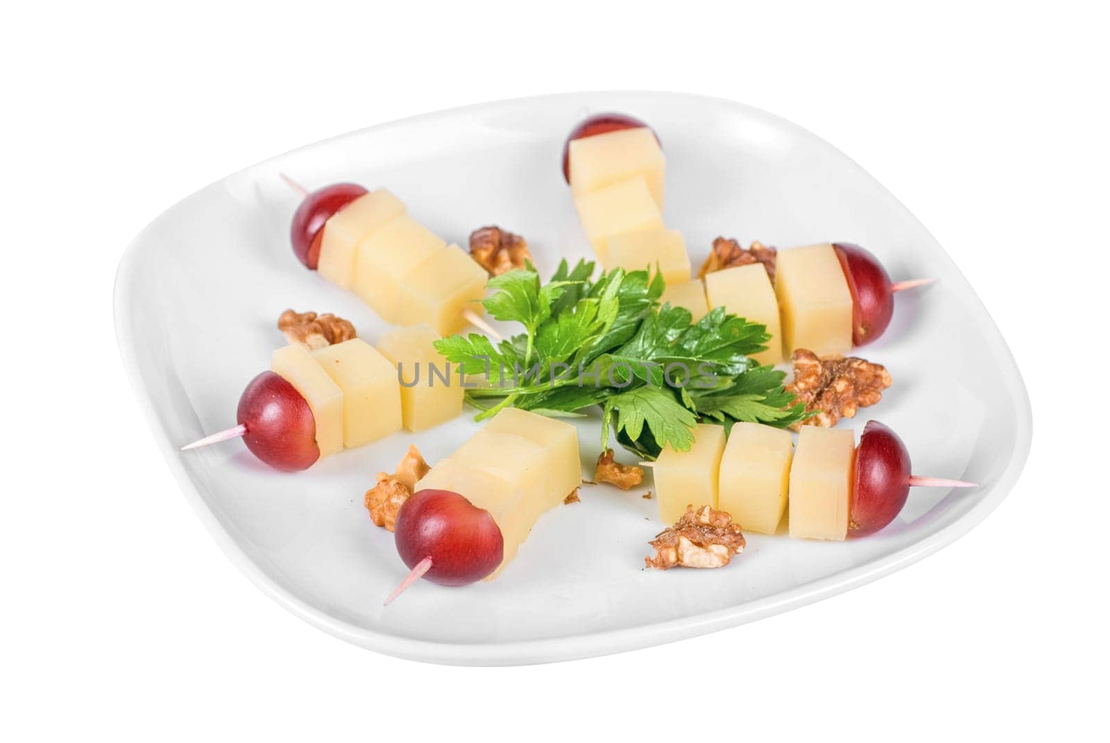 different cheese and grapes and nuts close up composition