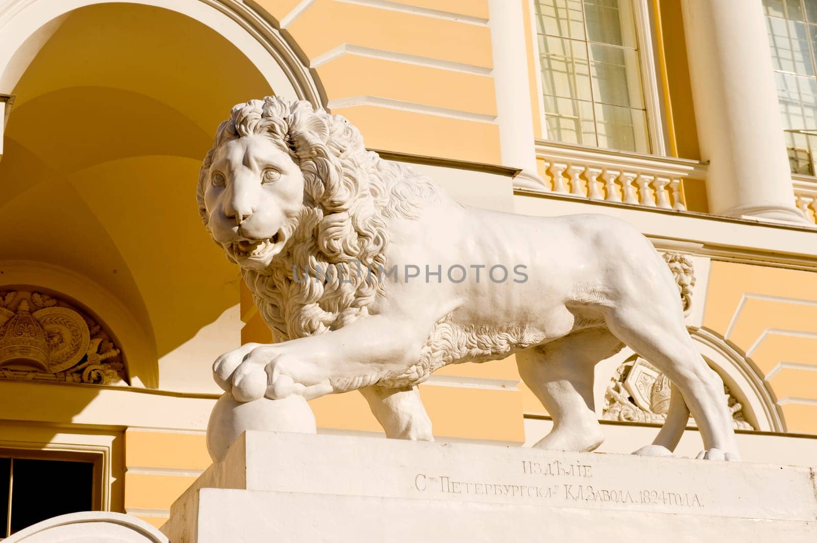 Sculpture of a lion before a facade of Russian Museum in Sankt Petersburg
