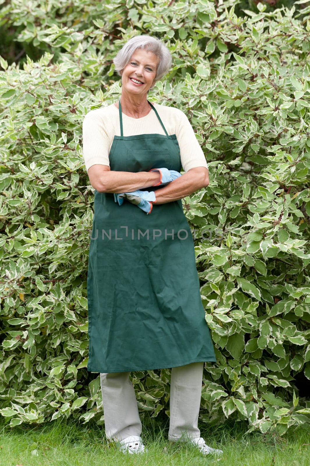 Active senior woman gardening
