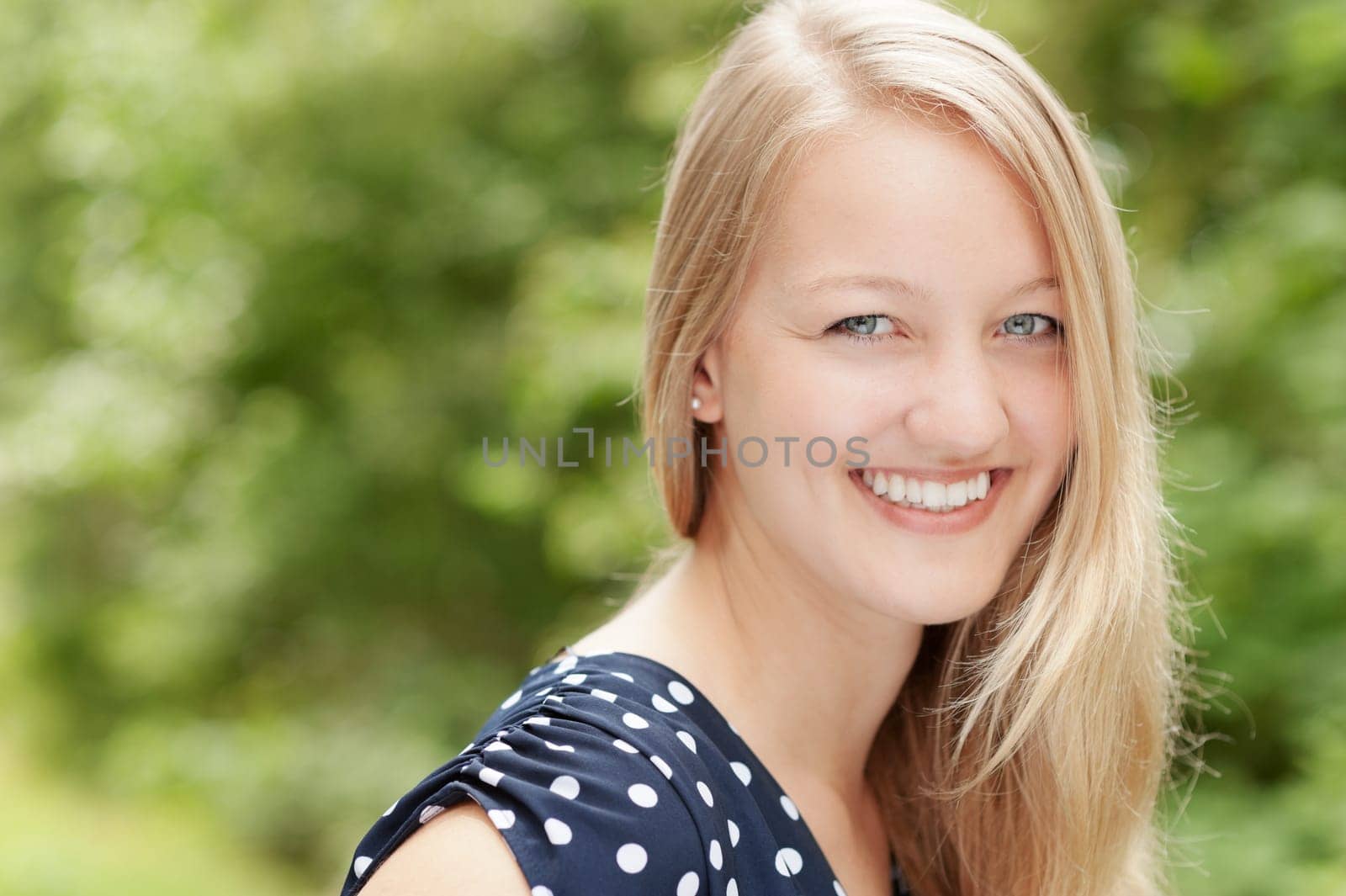 Portrait of a young and smiling woman