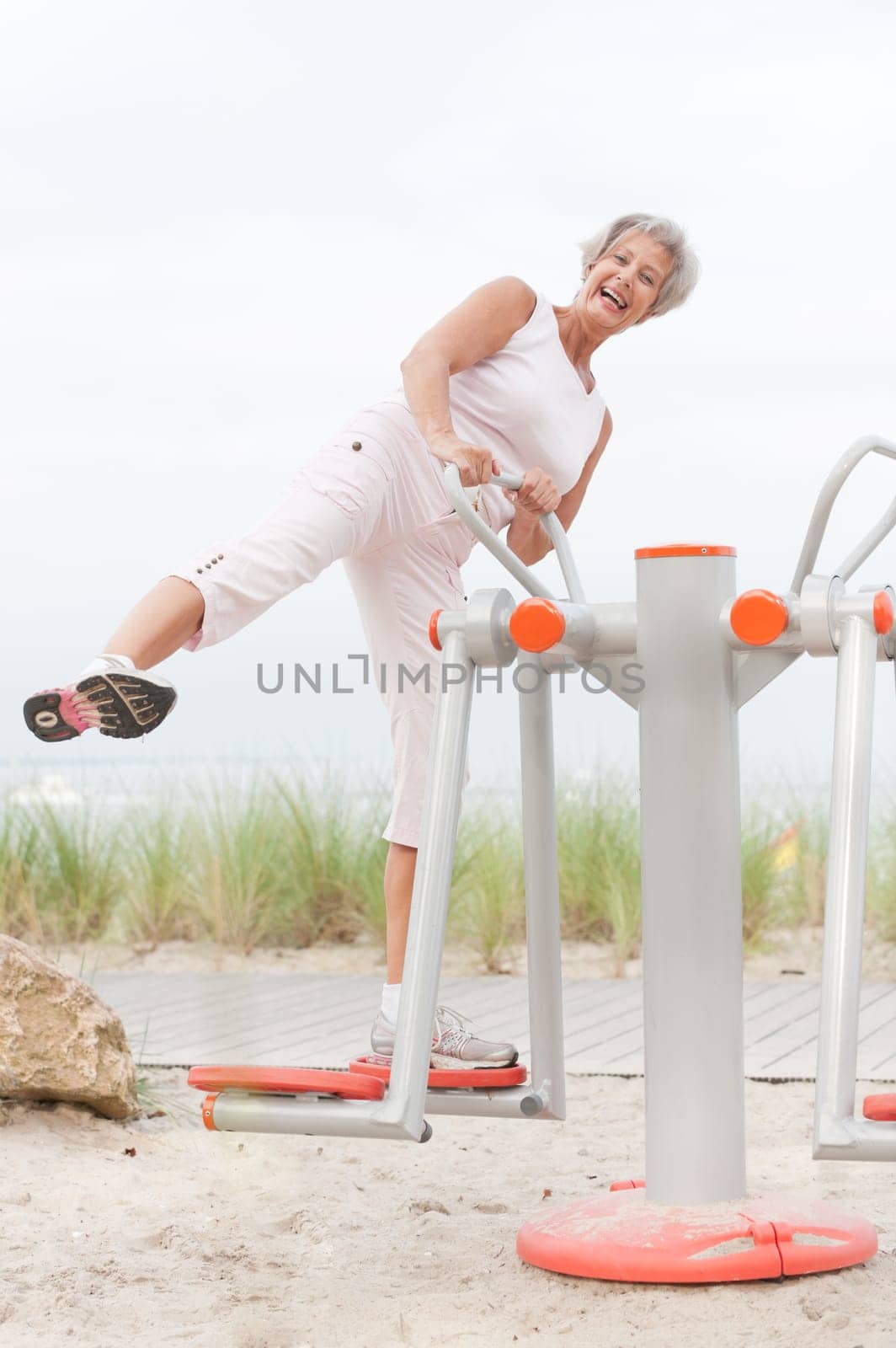 Active senior woman on the beach