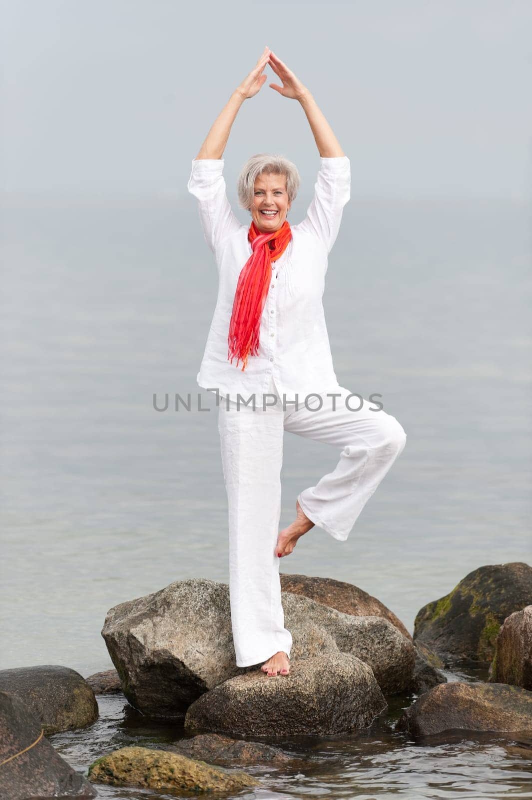 Active senior woman on the beach