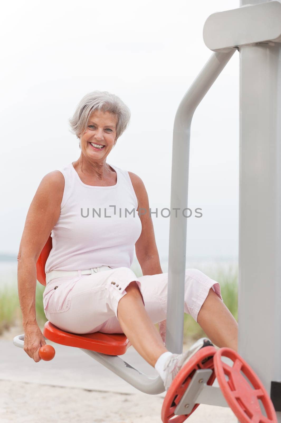 Active senior woman on the beach