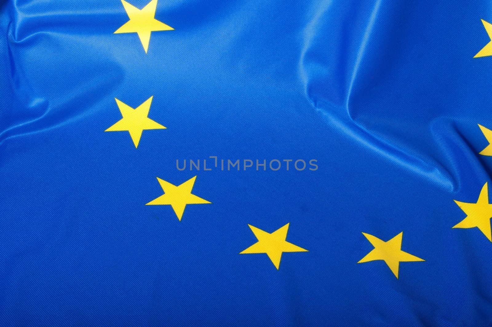 Detail of Silky Flag of Blue European Union EU Flag Drapery