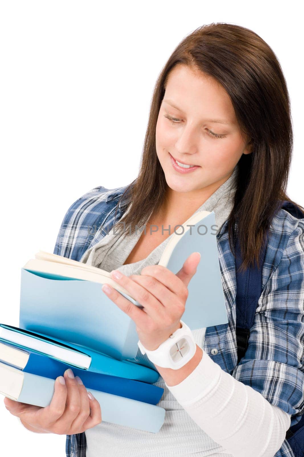 Student girl happy teenager with schoolbag look in books