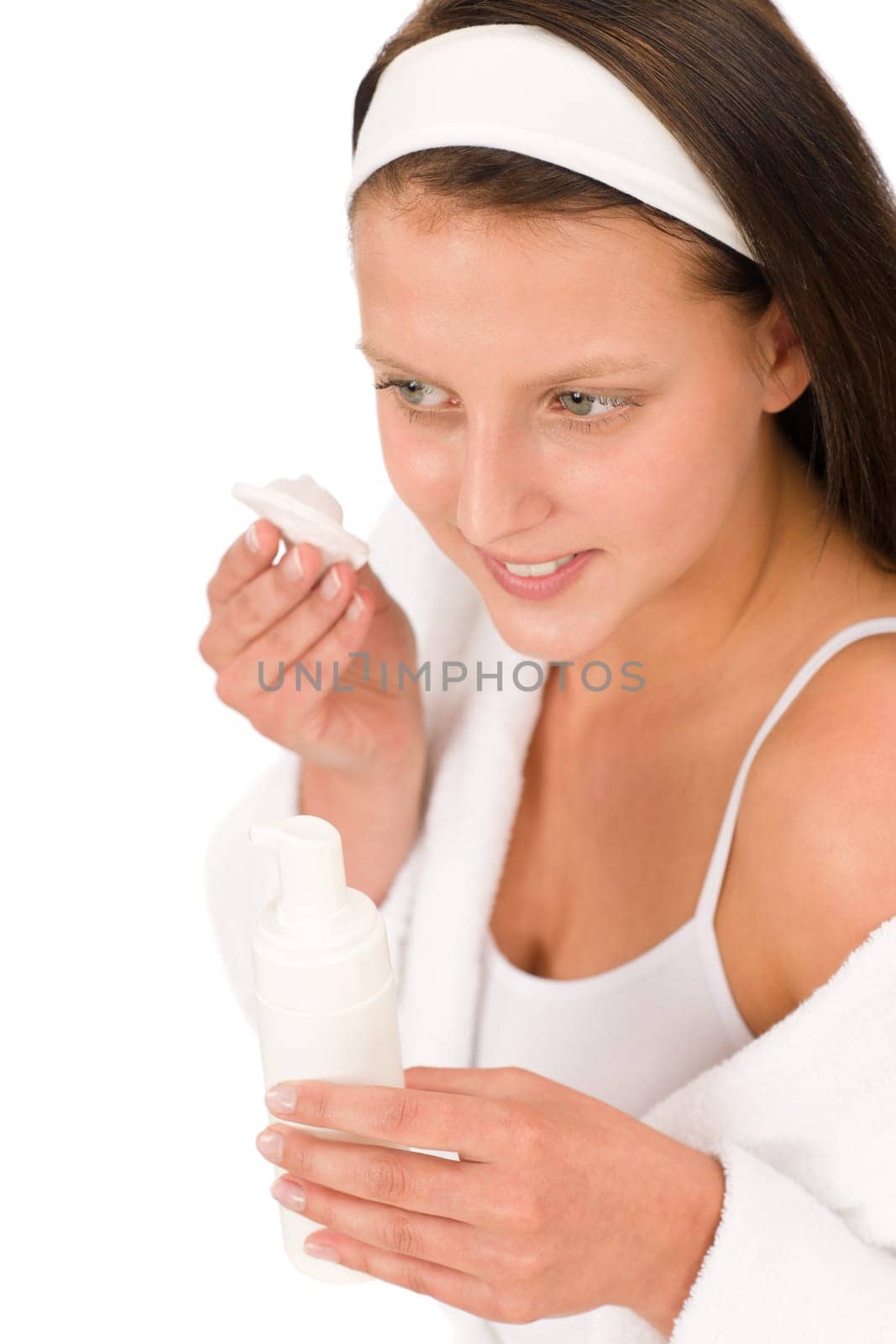 Acne facial care teenager woman apply cream foam on white