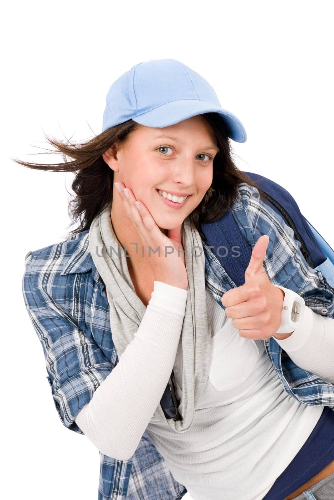 Smiling female teenager girl wear cool outfit thumb up