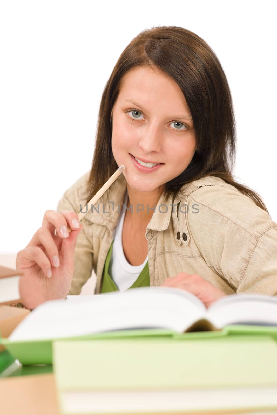 Student teenager happy girl write homework with book