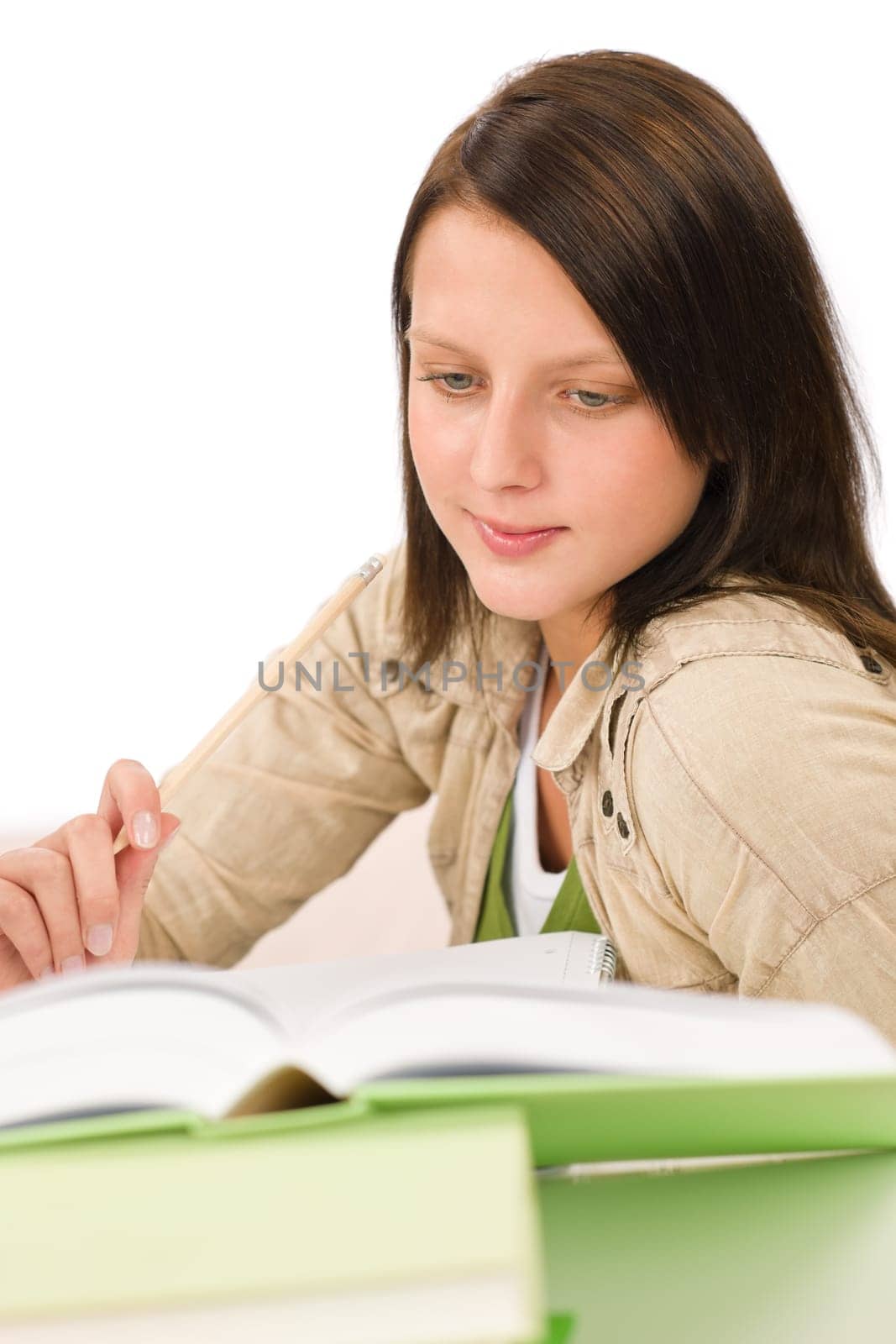 Student teenager happy girl write homework with book