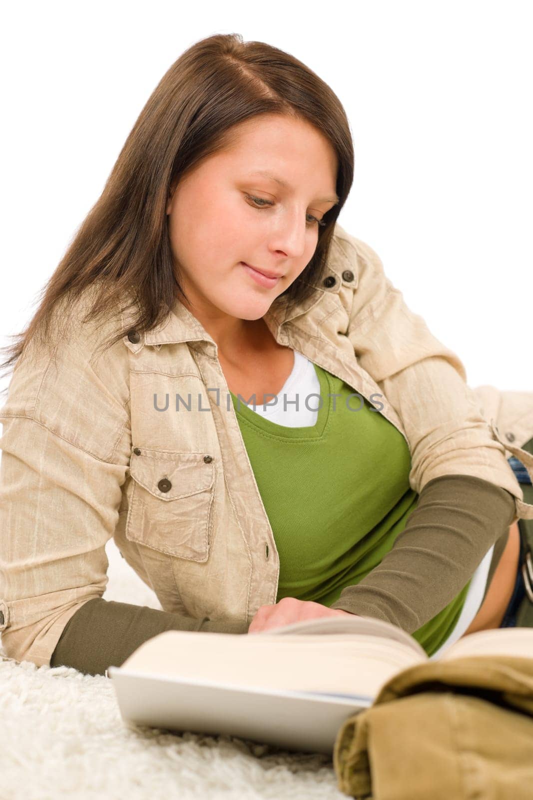 Student - female teenager write homework with book on white background