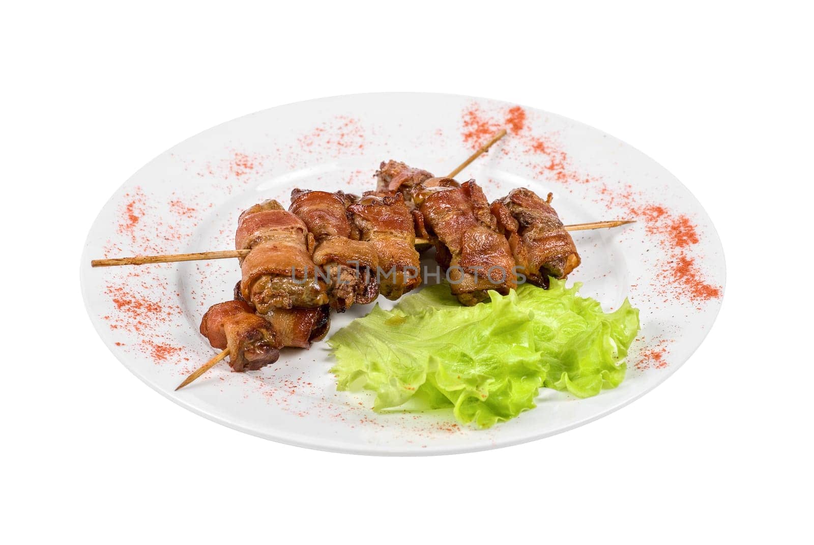 Kebab from chicken liver wrapped with bacon and garlic sauce