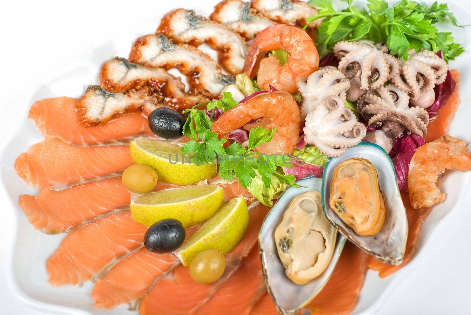 appetizer closeup of different seafood and vegetables