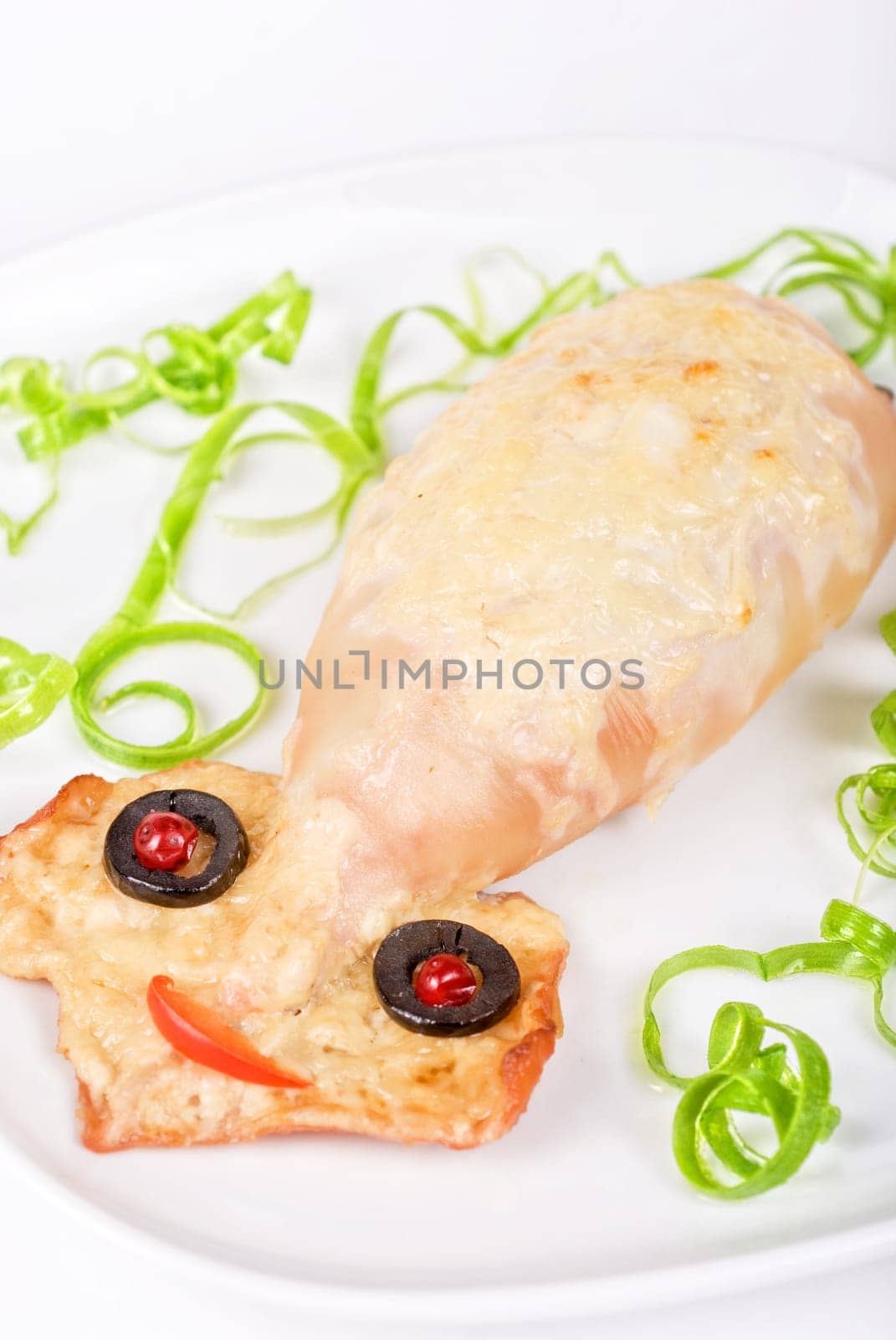 Baked squid at plate isolated on a white background