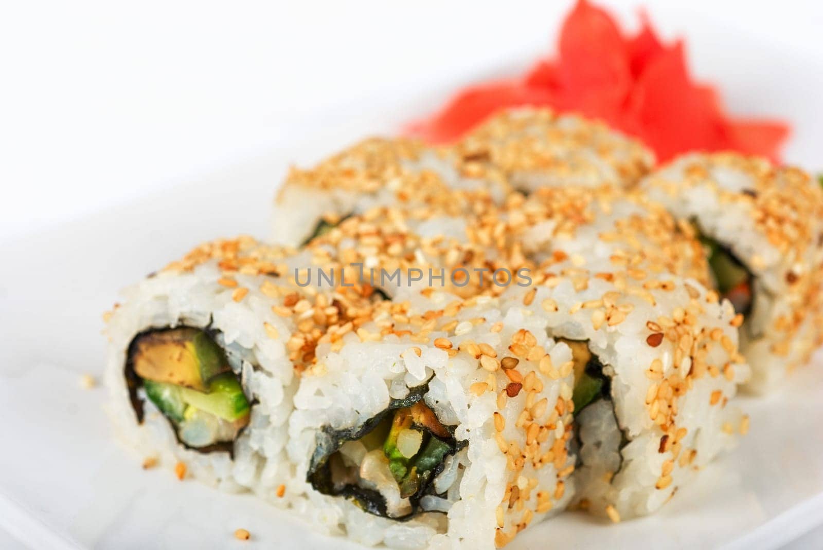 Sushi rolls at plate isolated on a white