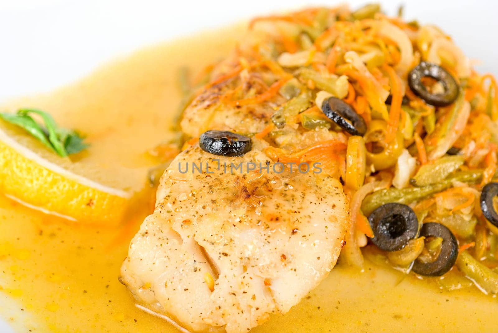 Tasty fish pike perch with mix of vegetables