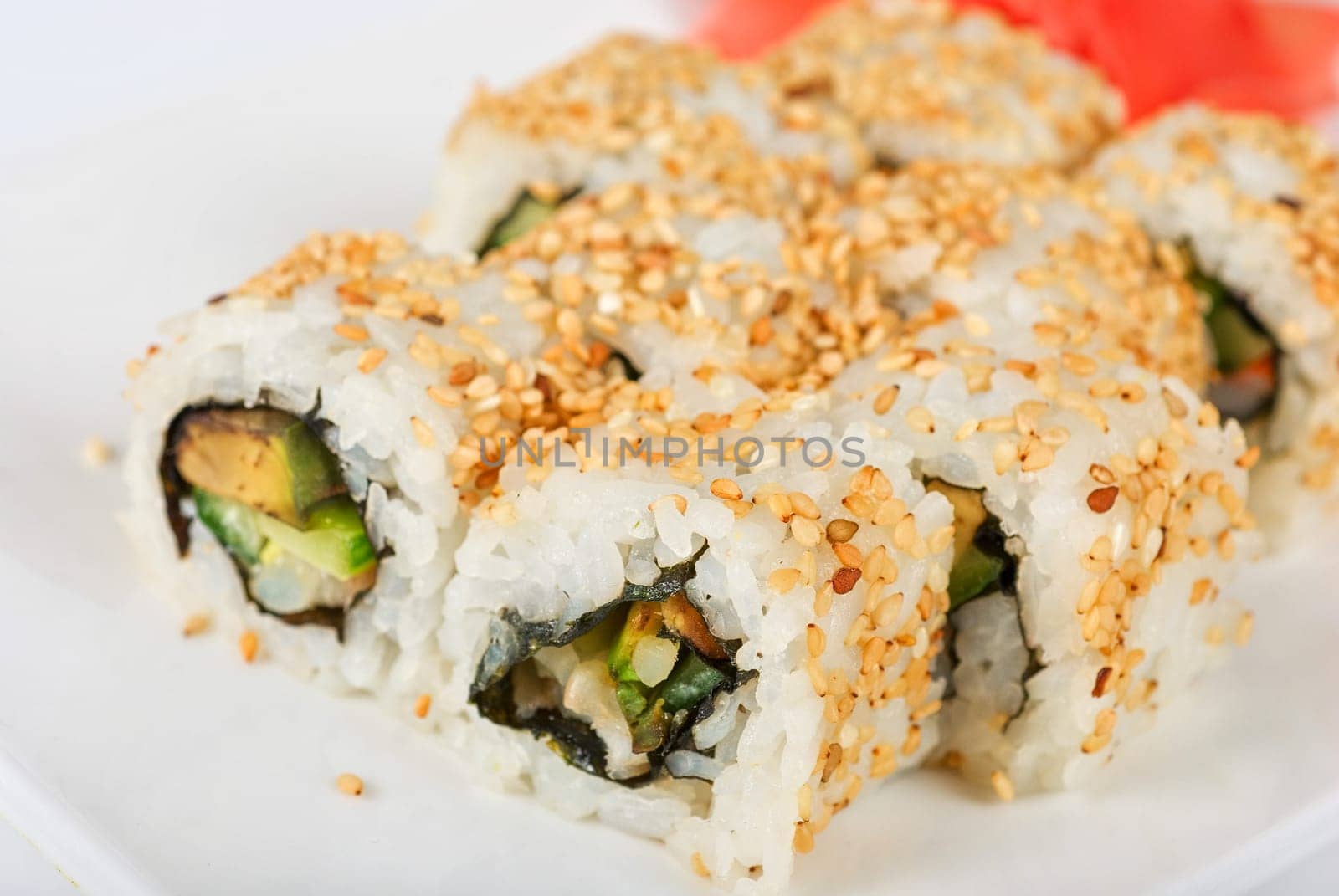 Sushi rolls at plate isolated on a white
