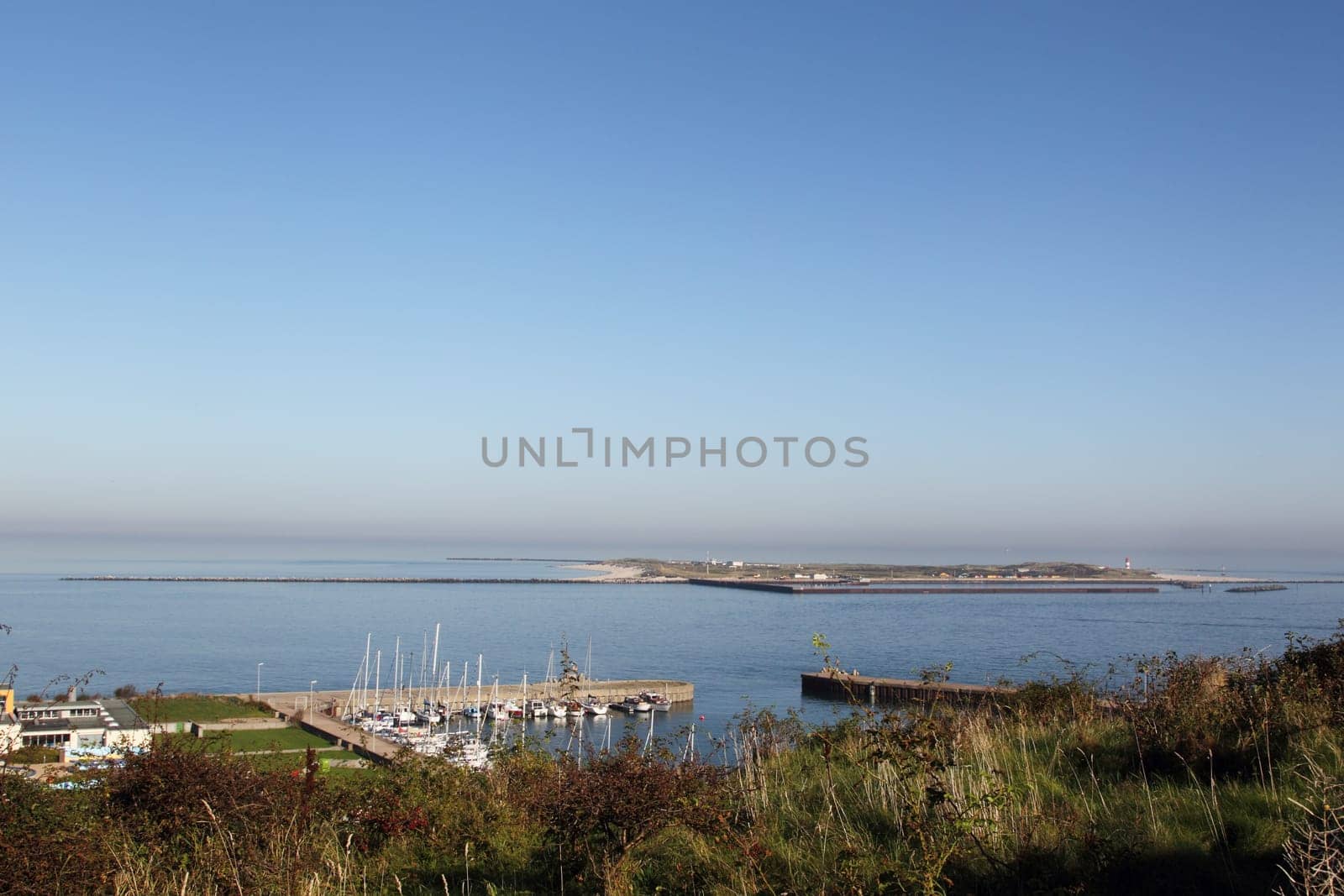 View over the marina of Heligoland to the neighboring island of Düne