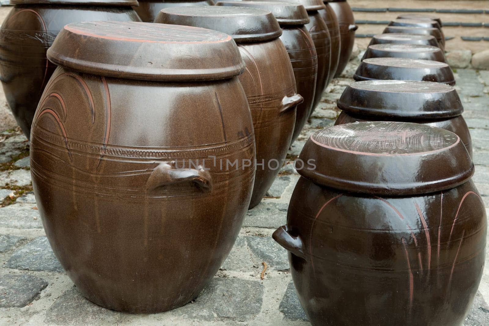 Clay jugs set up in two rows