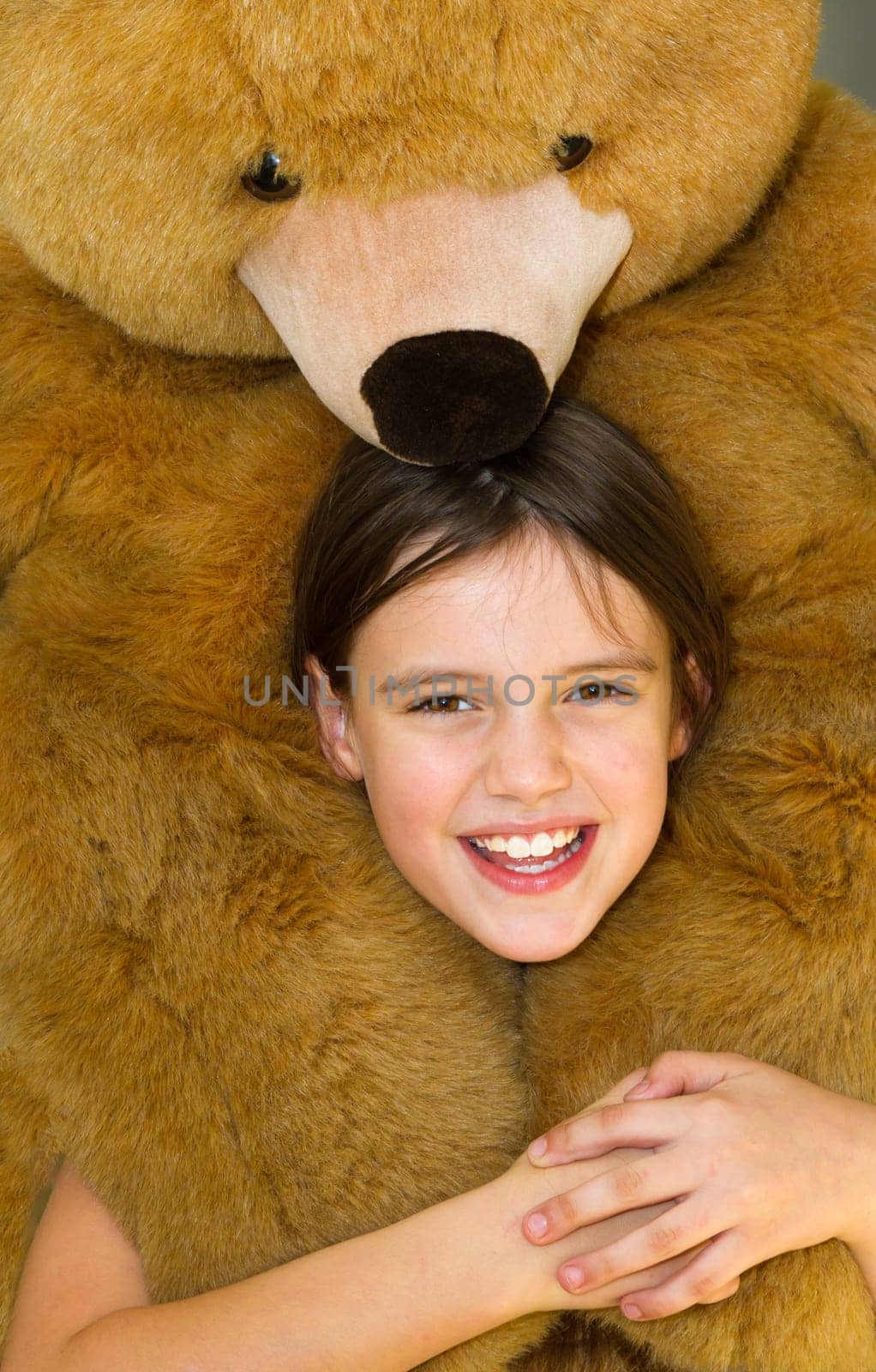 Little girl with teddy bear