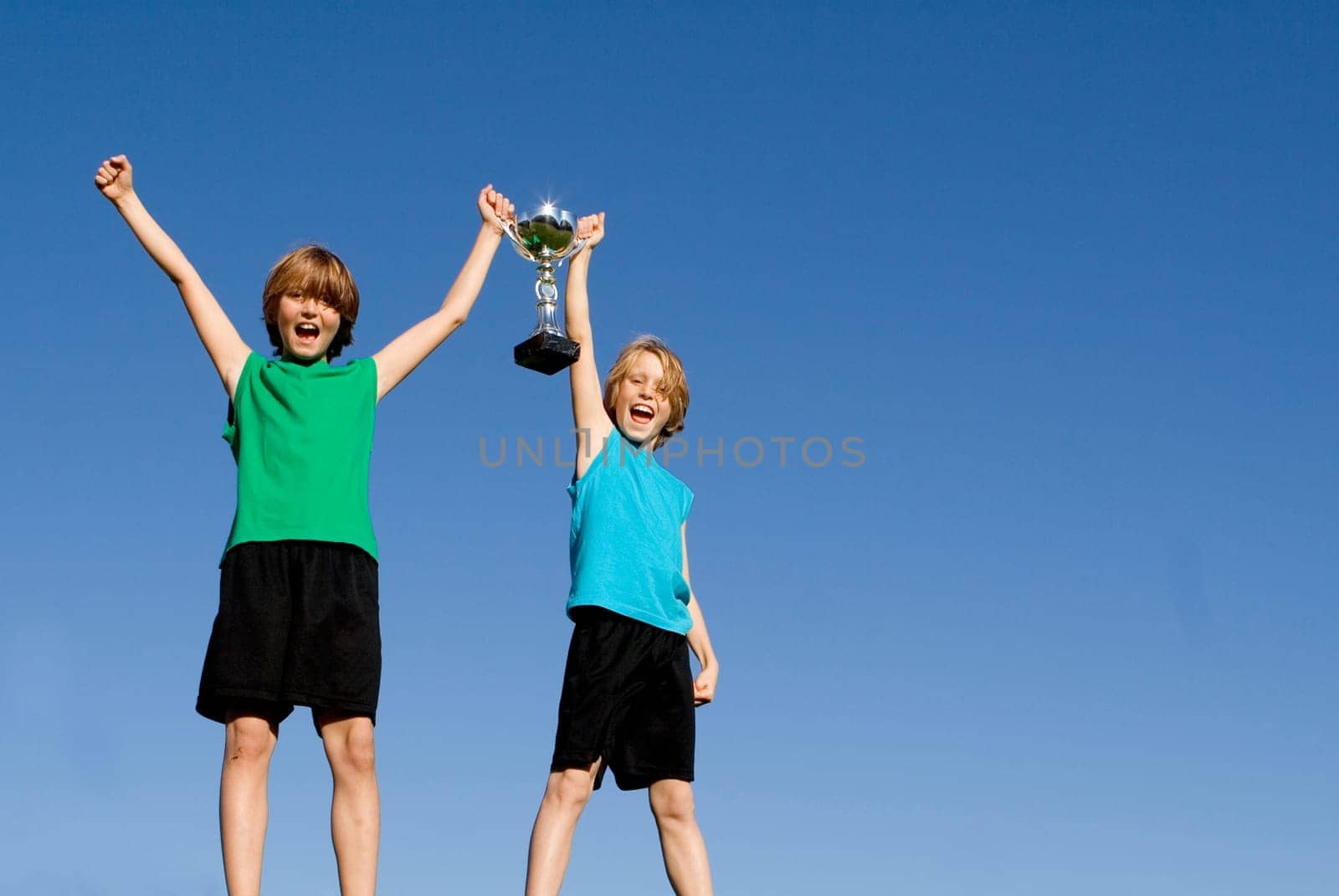 winning kids with sports cup