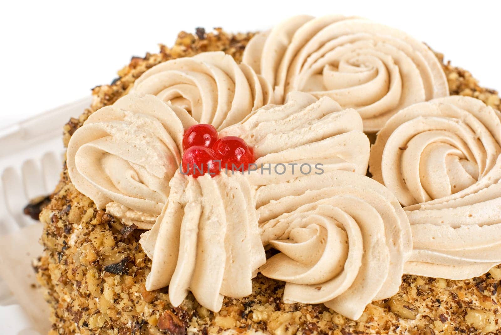 cake closeup with berry isolated on a white