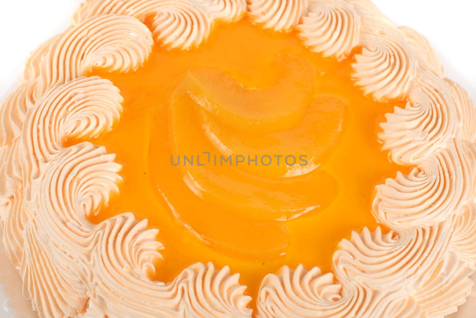 fruit orange cake closeup isolated on a white