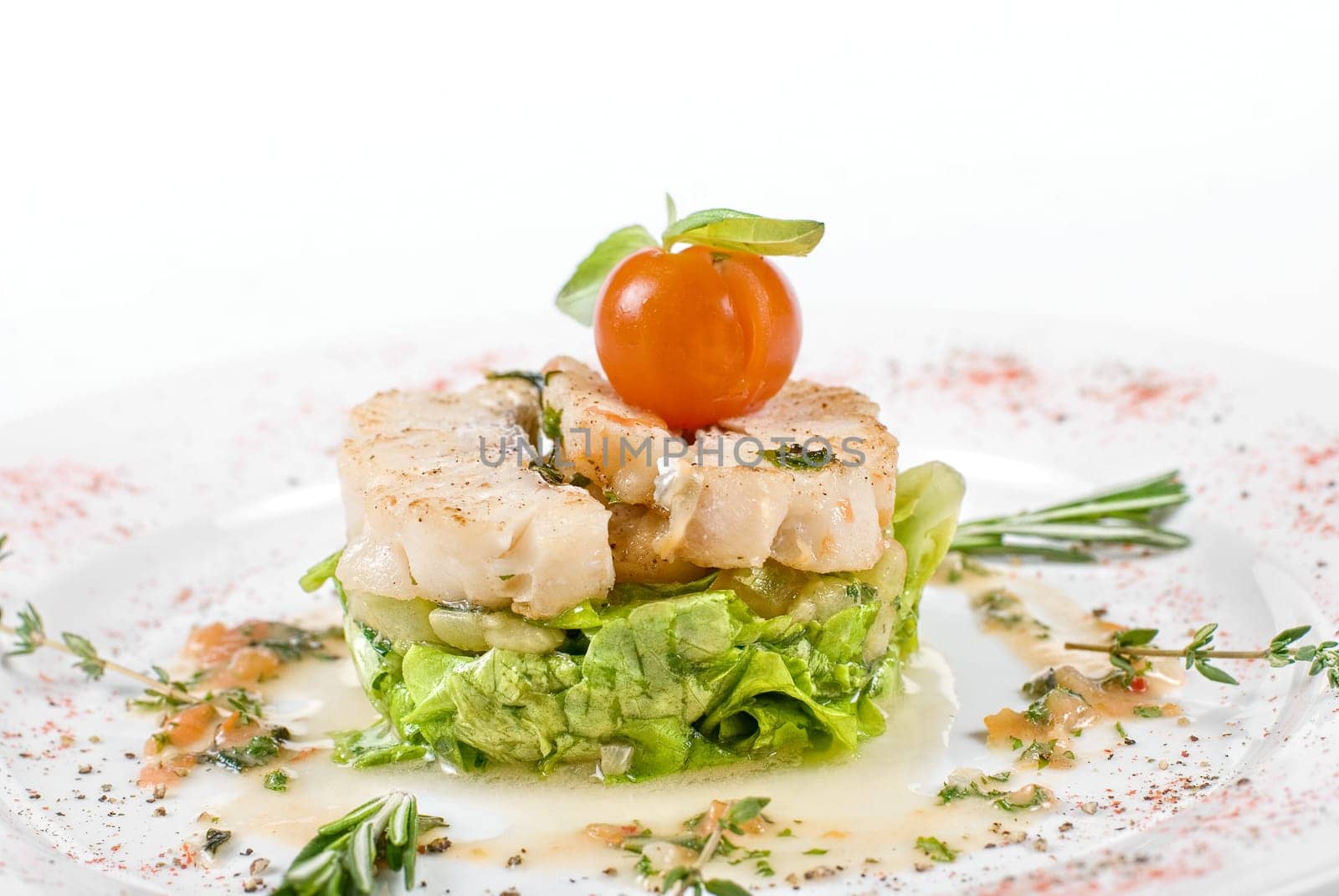 Salad of roasted filet pikeperch with courgette and aubergine, and cherry tomato