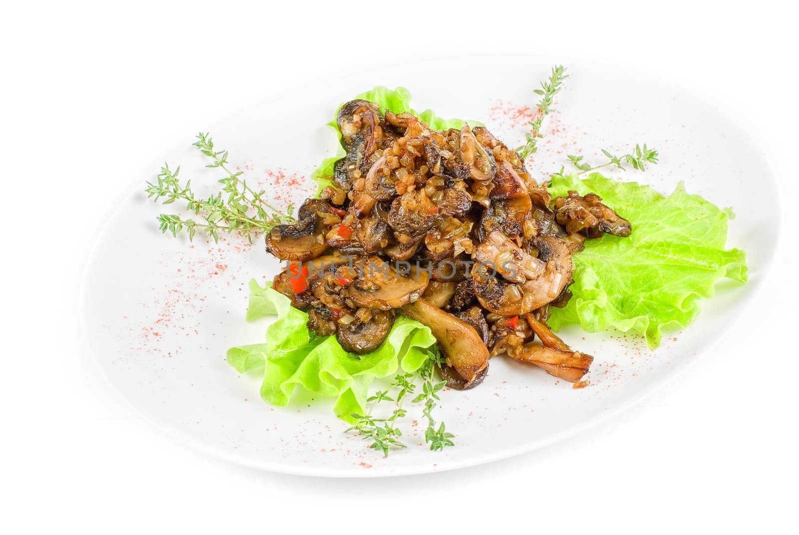 Roasted mushrooms salad isolated on a white background