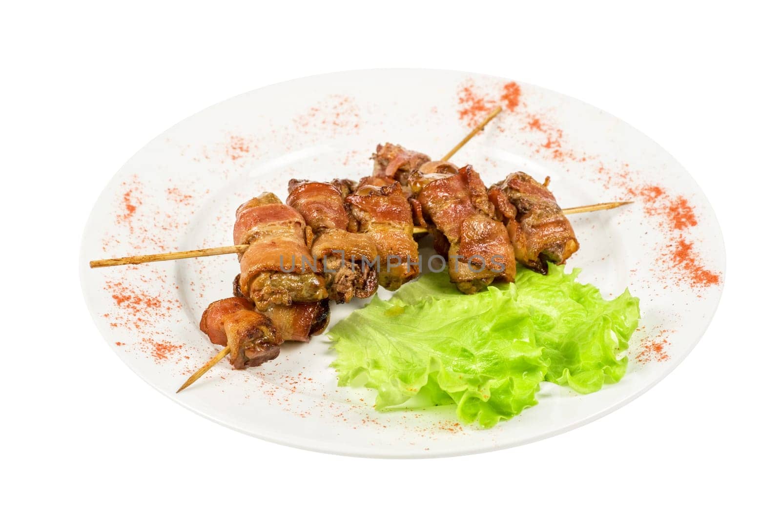 Kebab from chicken liver wrapped with bacon and garlic sauce
