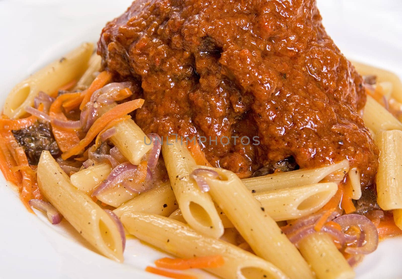 Macaroni with lamb meat and mushrooms