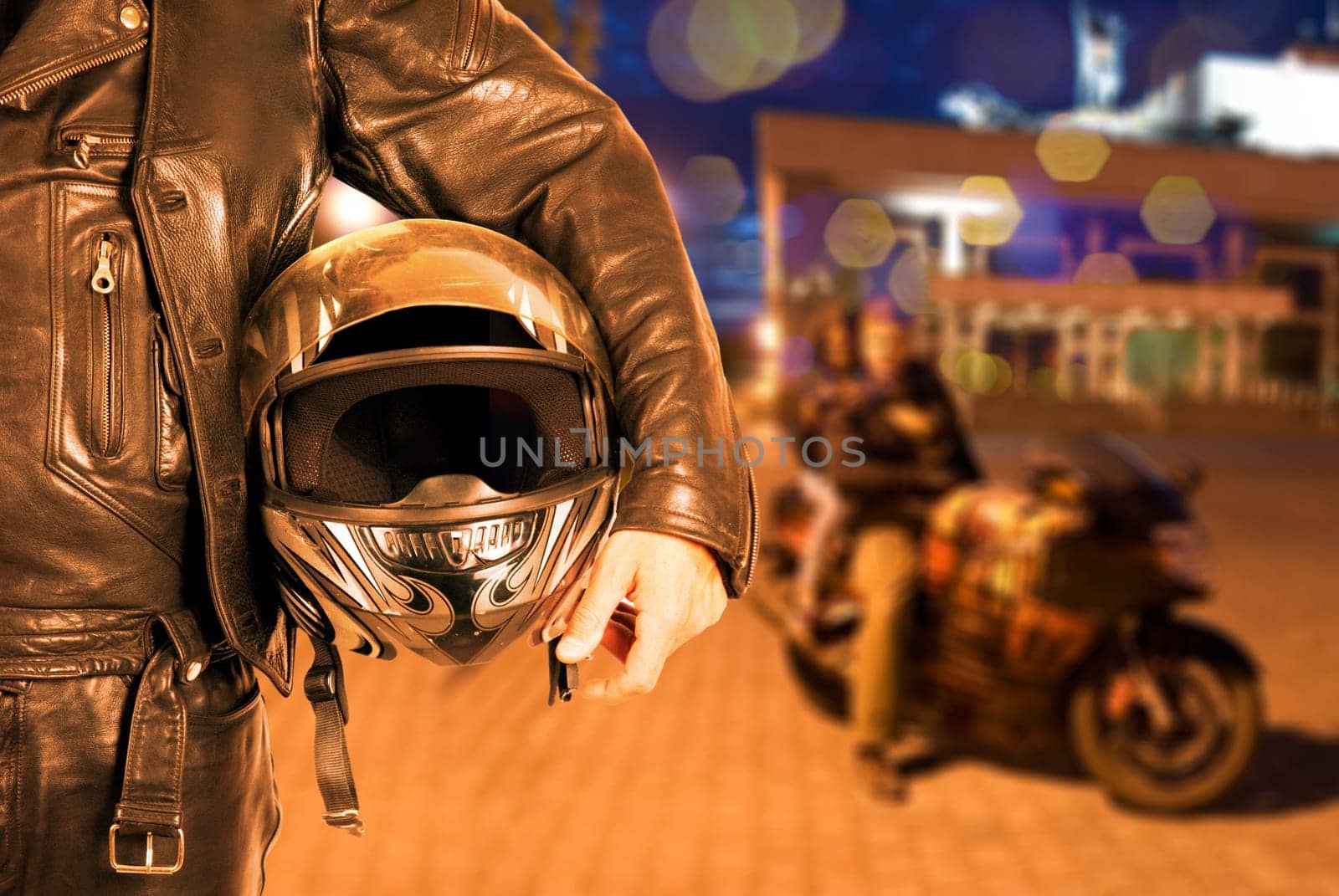 Biker closeup at night city background
