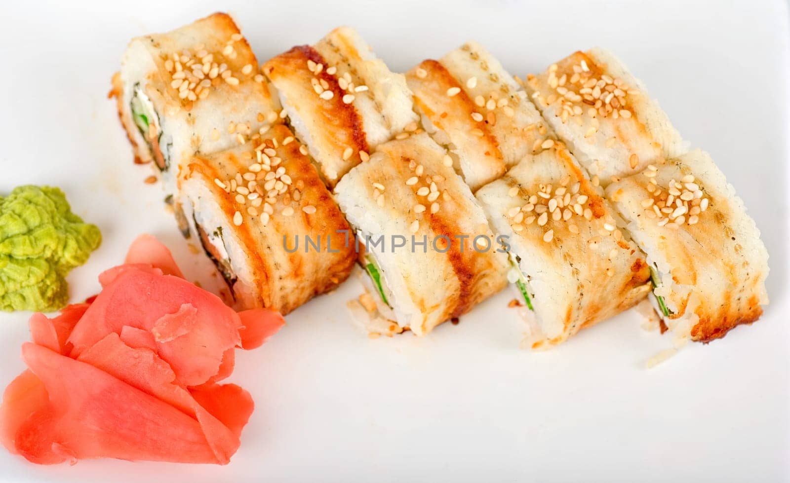 Sushi rolls at plate isolated on a white