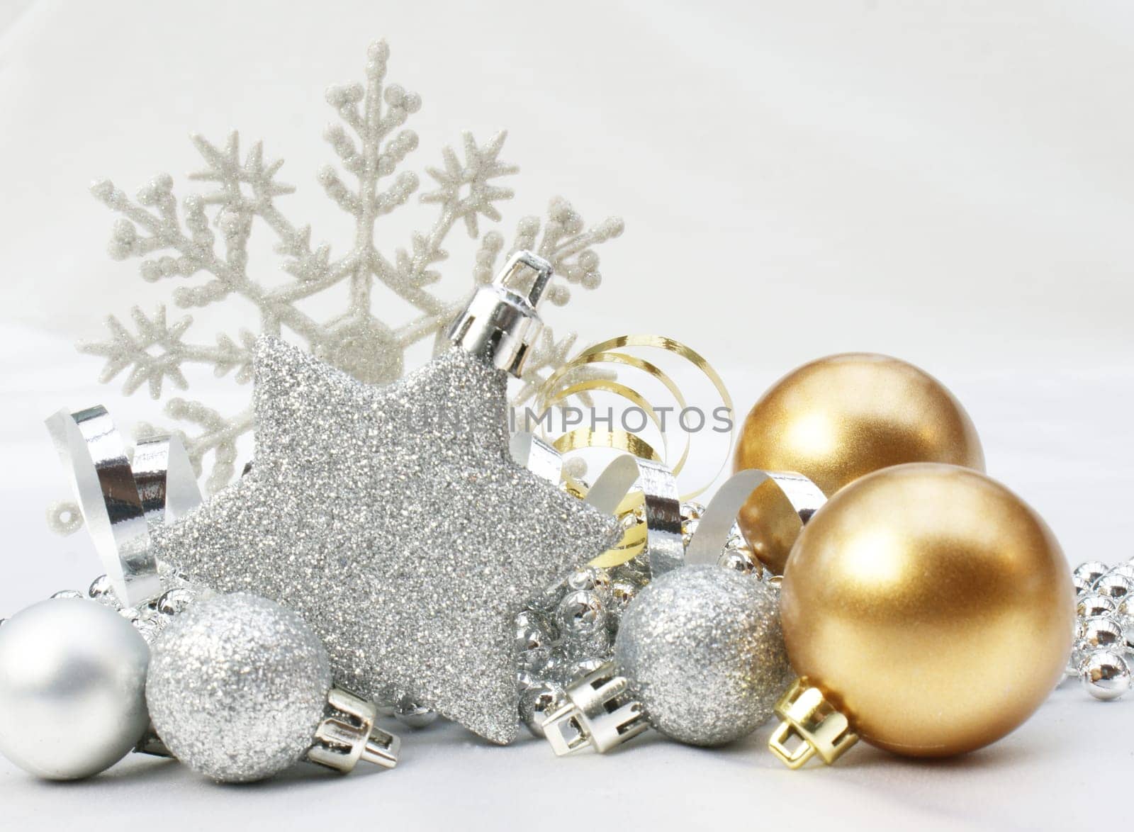 Christmas background with gold and silver decorations