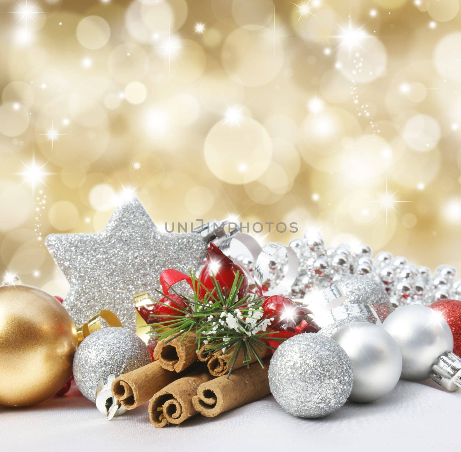 Christmas decorations on a glittery gold background