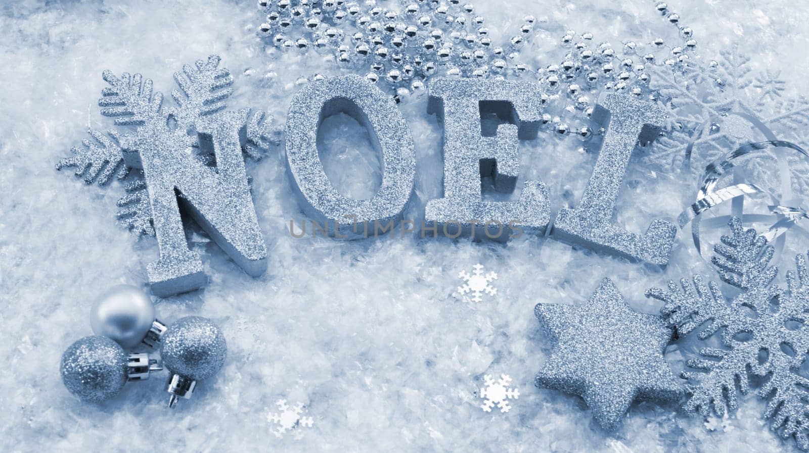 Christmas background with Noel in glittery letters