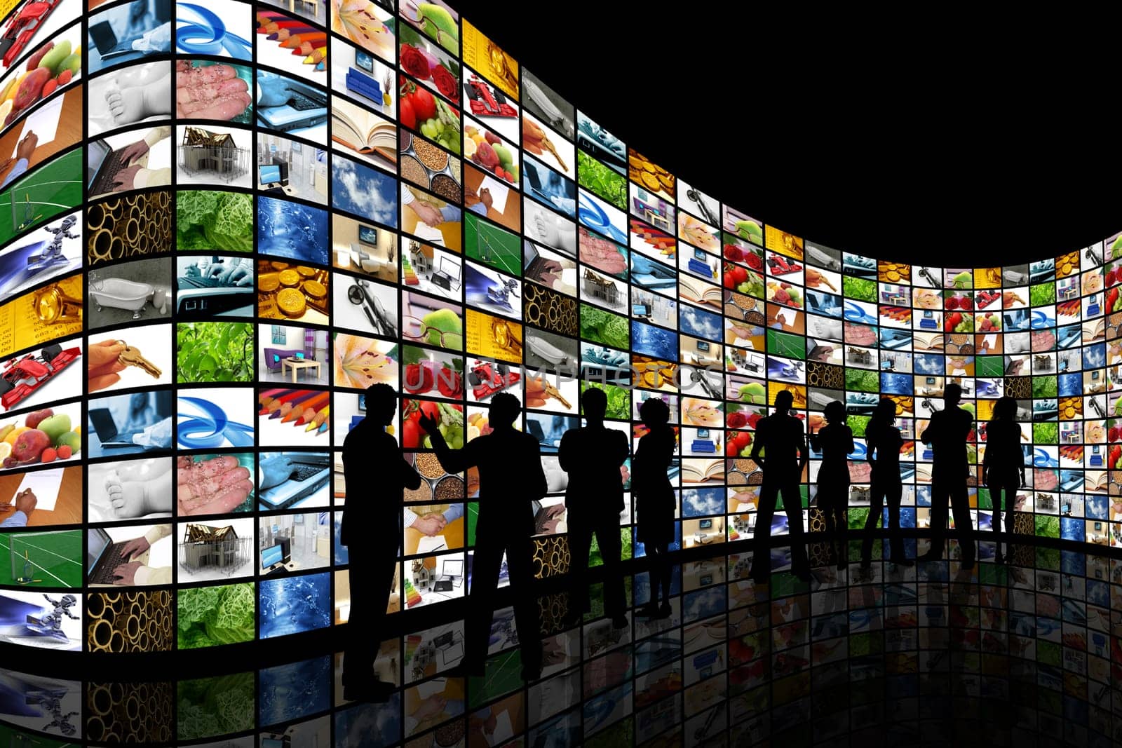 People silhouettes stood in front of a curved wall of screens