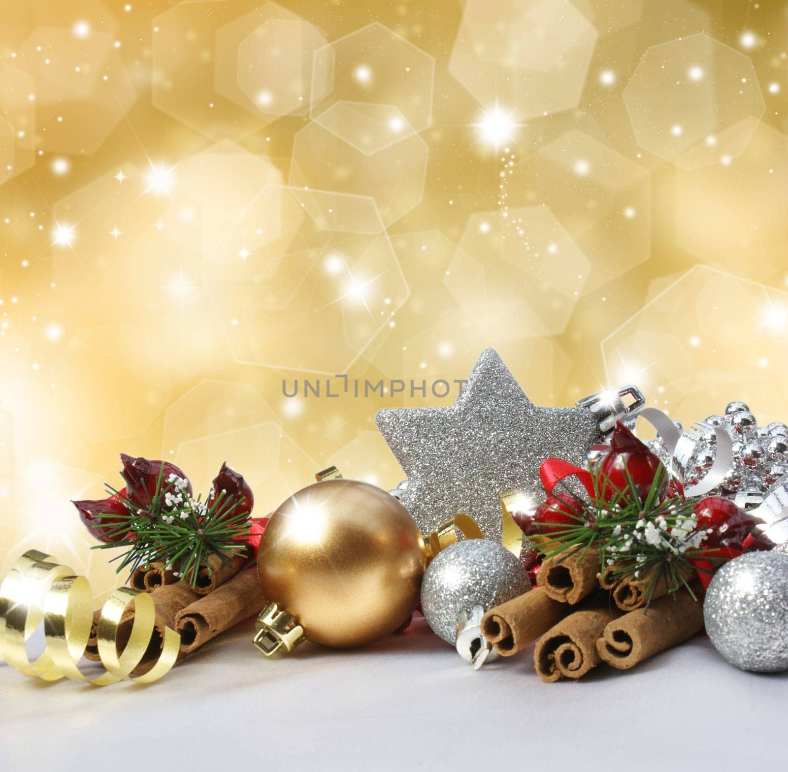 Christmas decorations on a glittery gold background