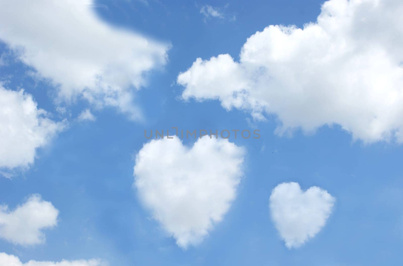 Clouds in the shape of hearts in a blue sky