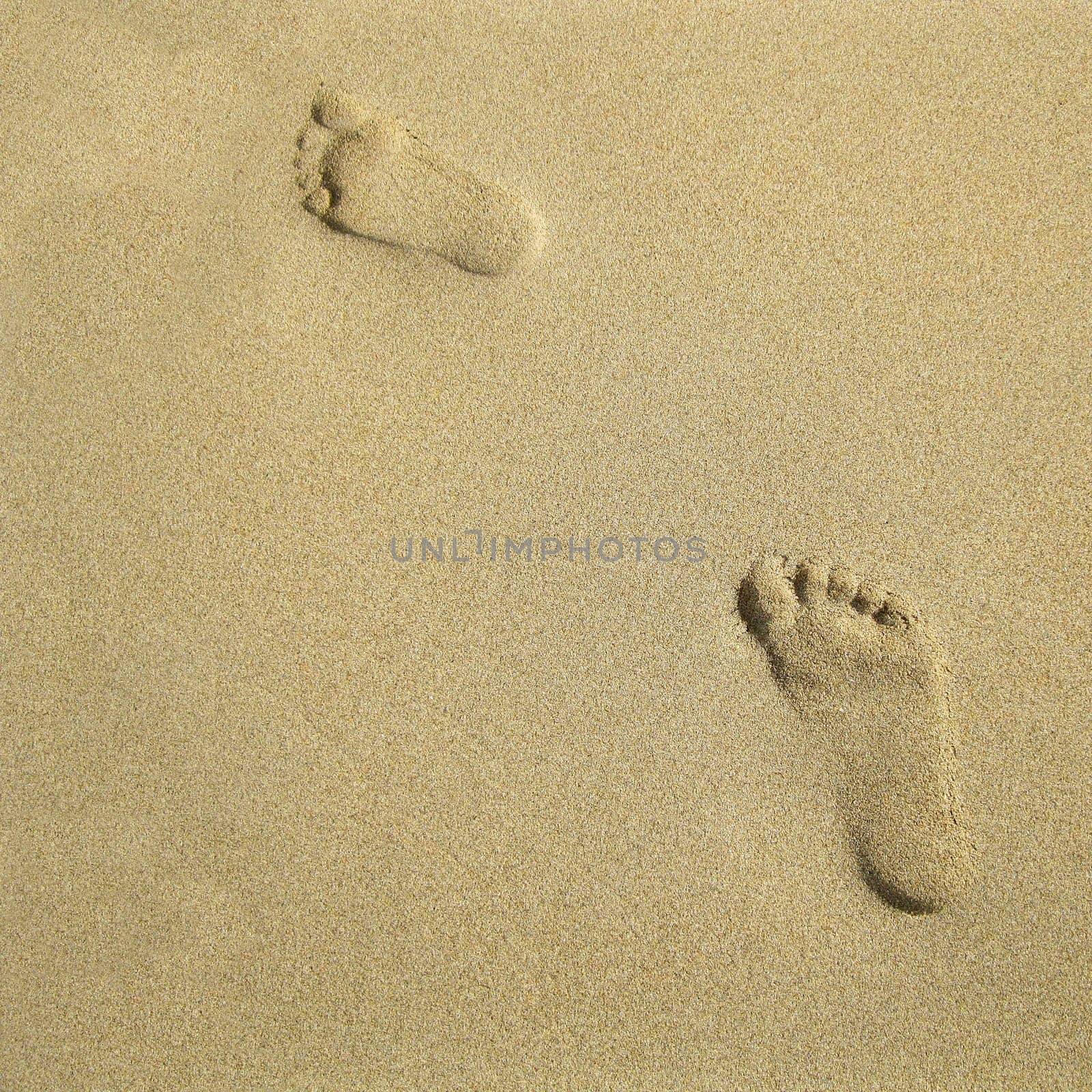 Two footprints in the sand