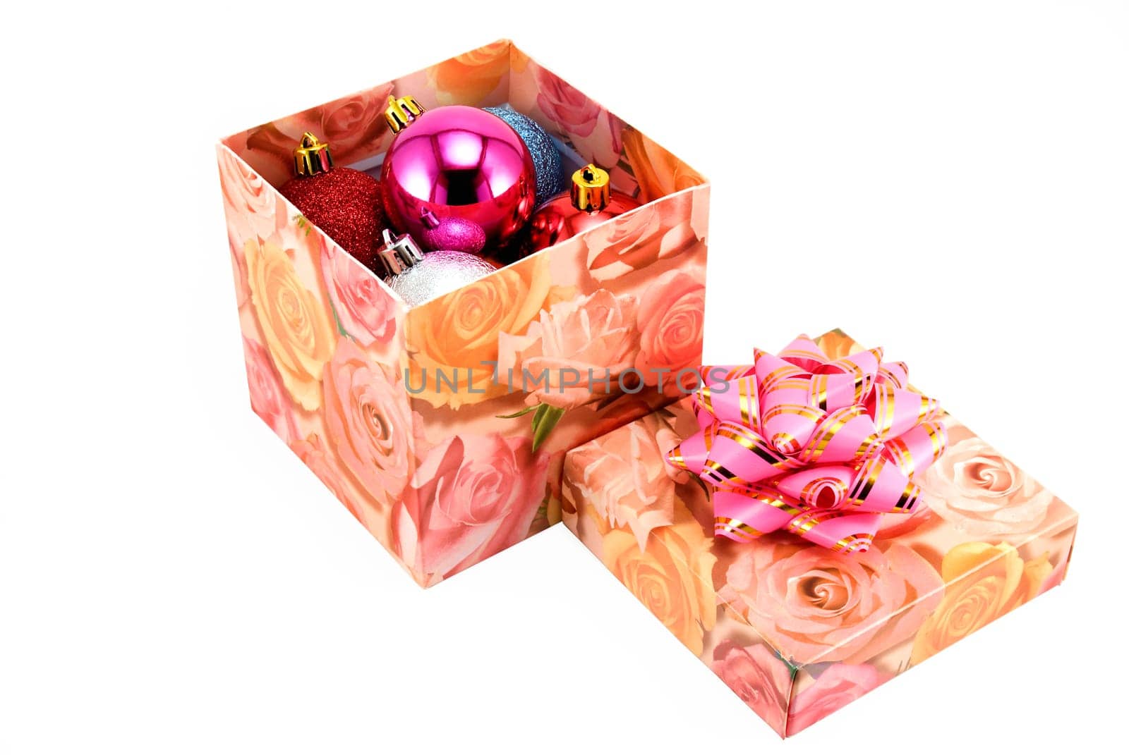 Open box with fur-tree toys