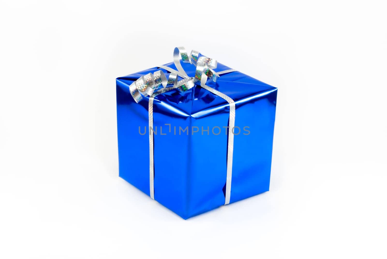 Gift box of blue color with a silvery tape