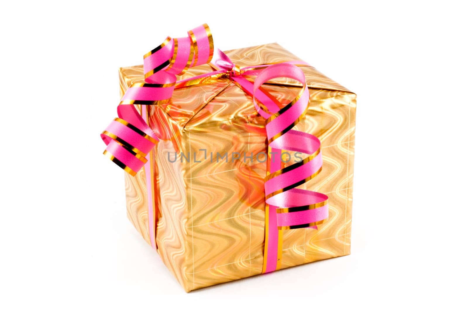 Gift box of yellow color with a pink tape