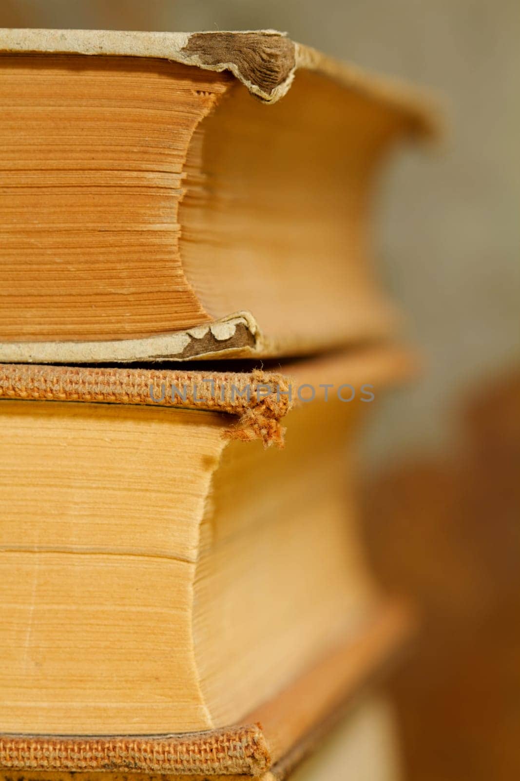 Stack of weathered and vintage antique books