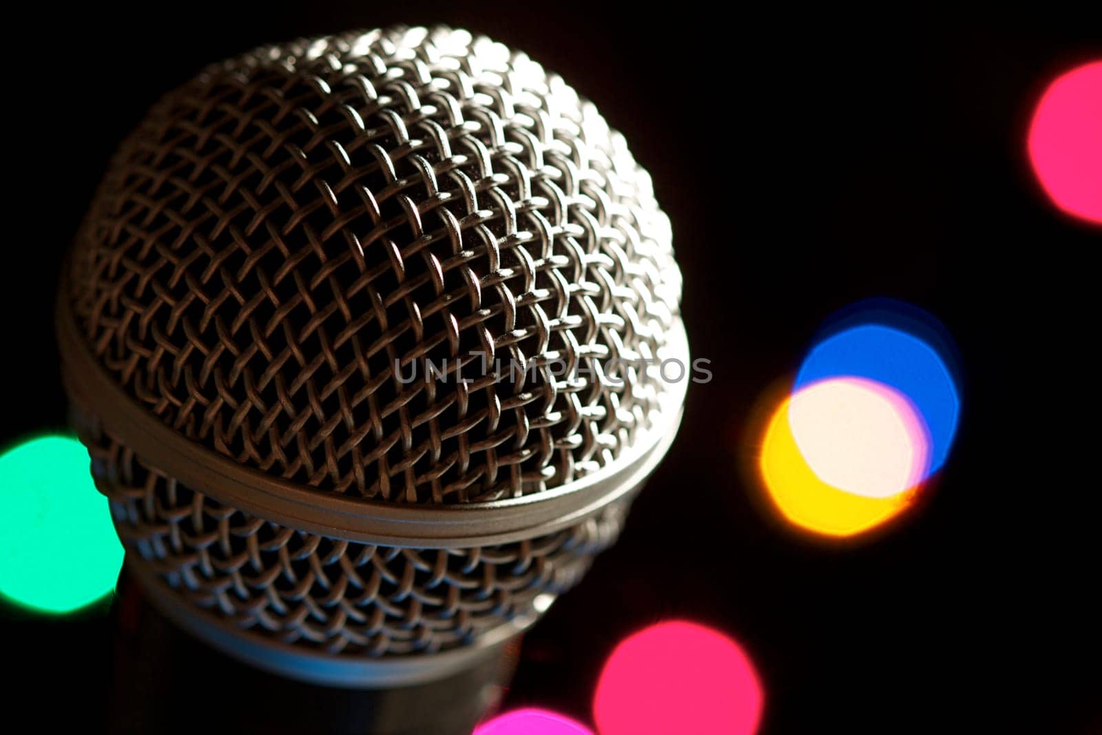 On stage microphone of a popular artist with spot lights