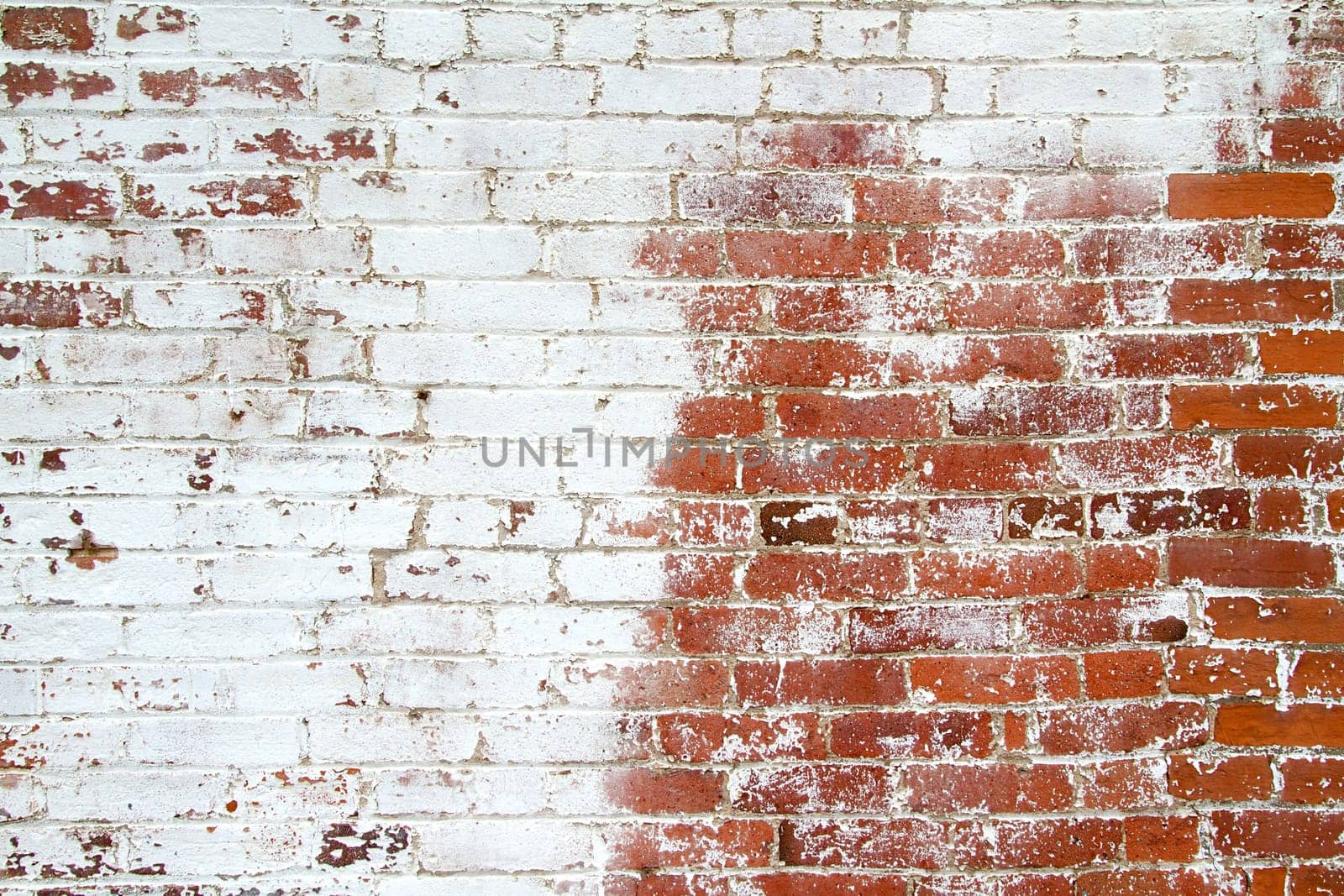 The dirty texture of a brick patterned wall