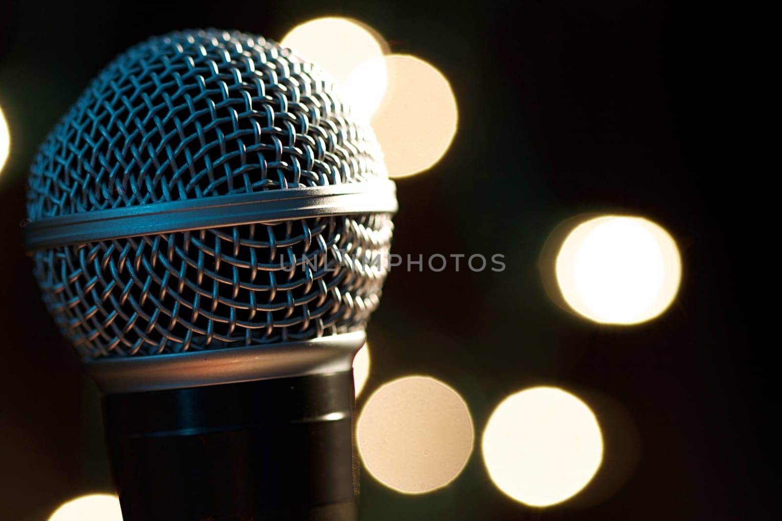 On stage microphone of a popular artist with spot lights