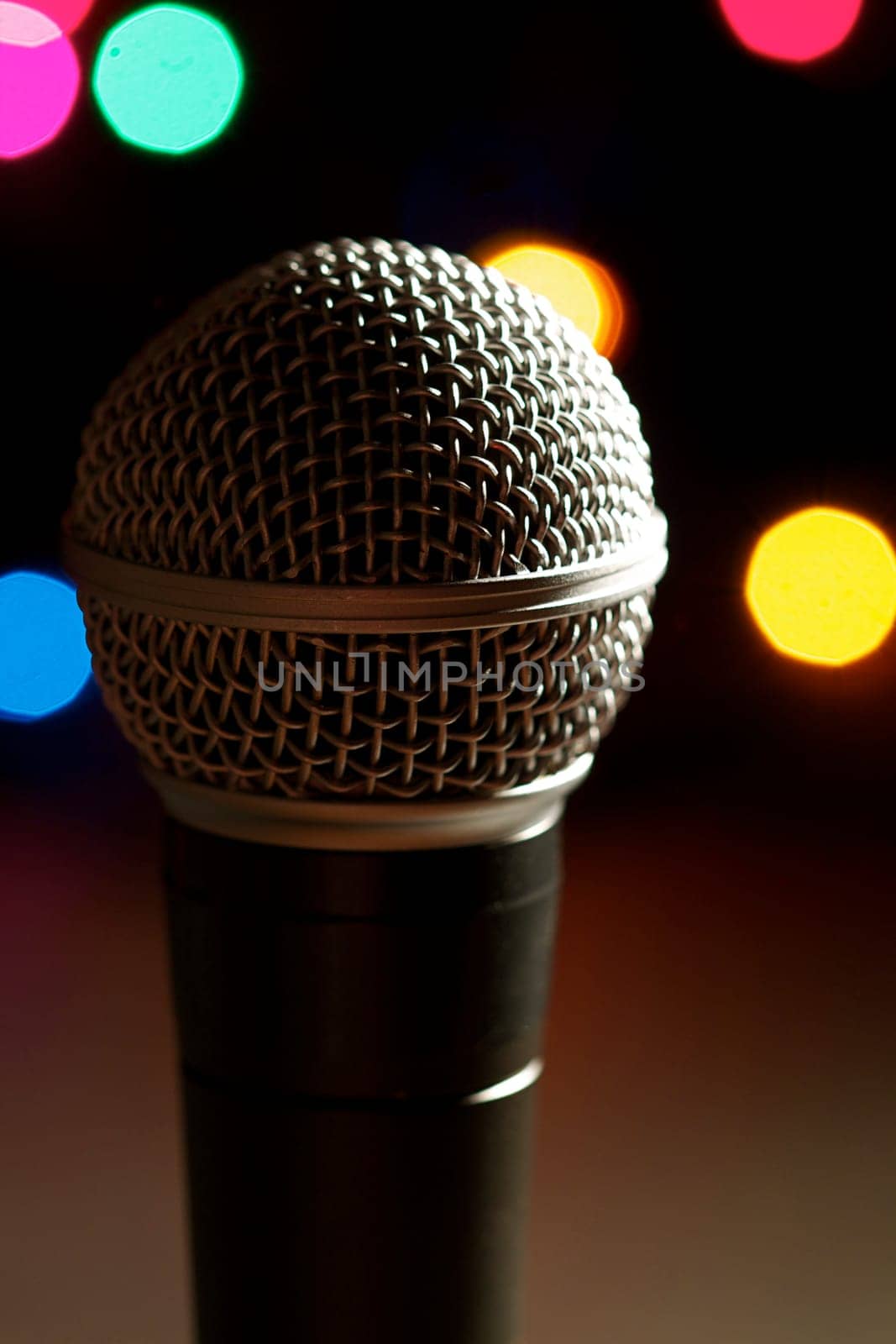 On stage microphone of a popular artist with spot lights